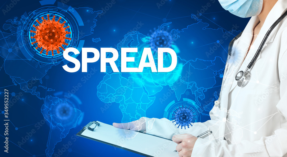 Doctor fills out medical record with SPREAD inscription, virology concept Doctor fills out medical record with SPREAD inscription, virology concept