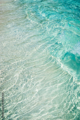 close up of tropical aquamarine rippled sea - clear blue water © mathilde