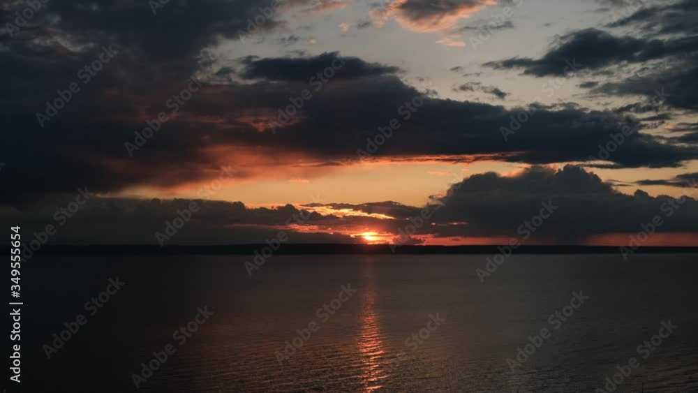 Amazing sunrise over the tropical beach. Yellow sun over sea. Amazing sunrise over the tropical beach. Yellow sun over sea.