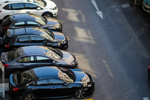 Wallpaper Mural Top view of car parking area on asphalt road Torontodigital.ca