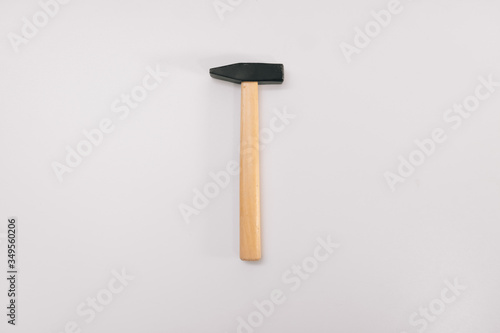 wooden work hammer on a white background isolation. Copy space on top. Construction Tools Sale Concept