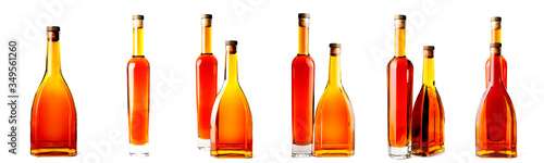 several bottles of brandy whiskey isolated on a white background