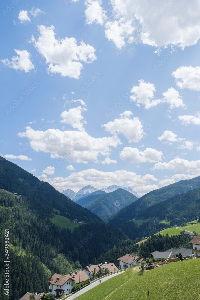 Cloudy sky over a valley during summer  in Trentino Alto Adige, Italy