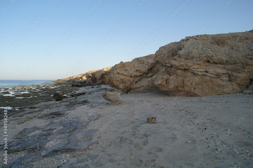Beautiful seascape. Sea and rock at the sunset. Red sea, Egypt.