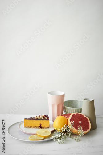Piece of cake and fruits