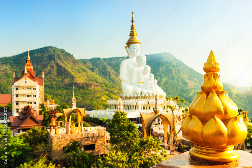Naklejka premium Amazing Thailand Temple with big Buddha statue on background scenery nature landscape at sunrise. Beautiful Landmark of Asia, Asian culture and religion.