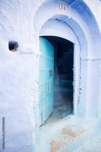 Chefchouen Moroccan blue door in city in the mountains  © Bart