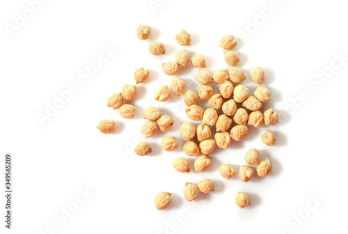 Small pile of chickpeas isolated on white background. Top view.