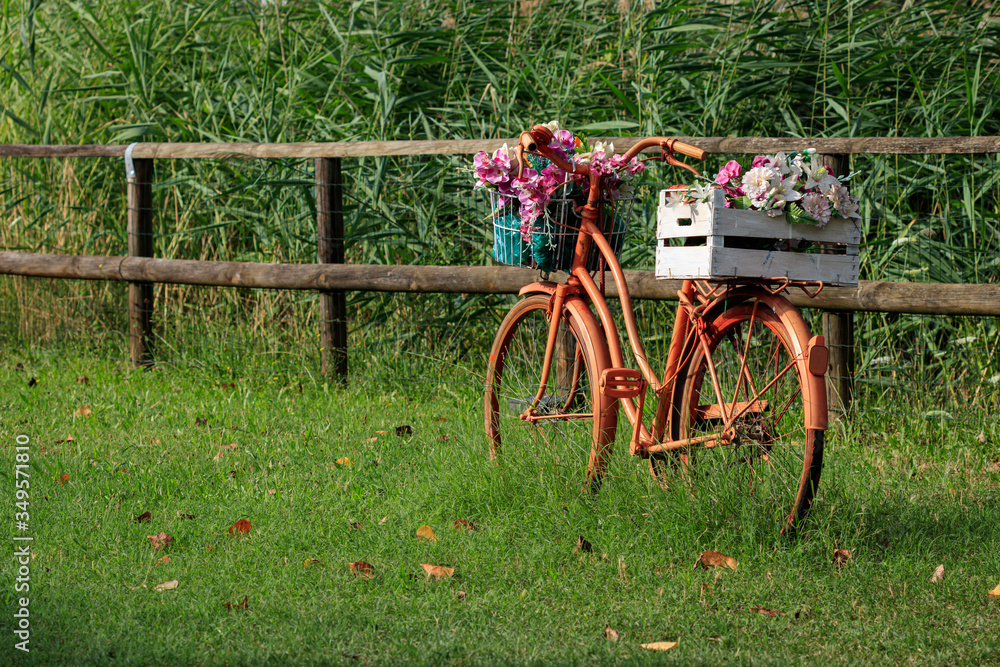 old bicycle decorated with flowers