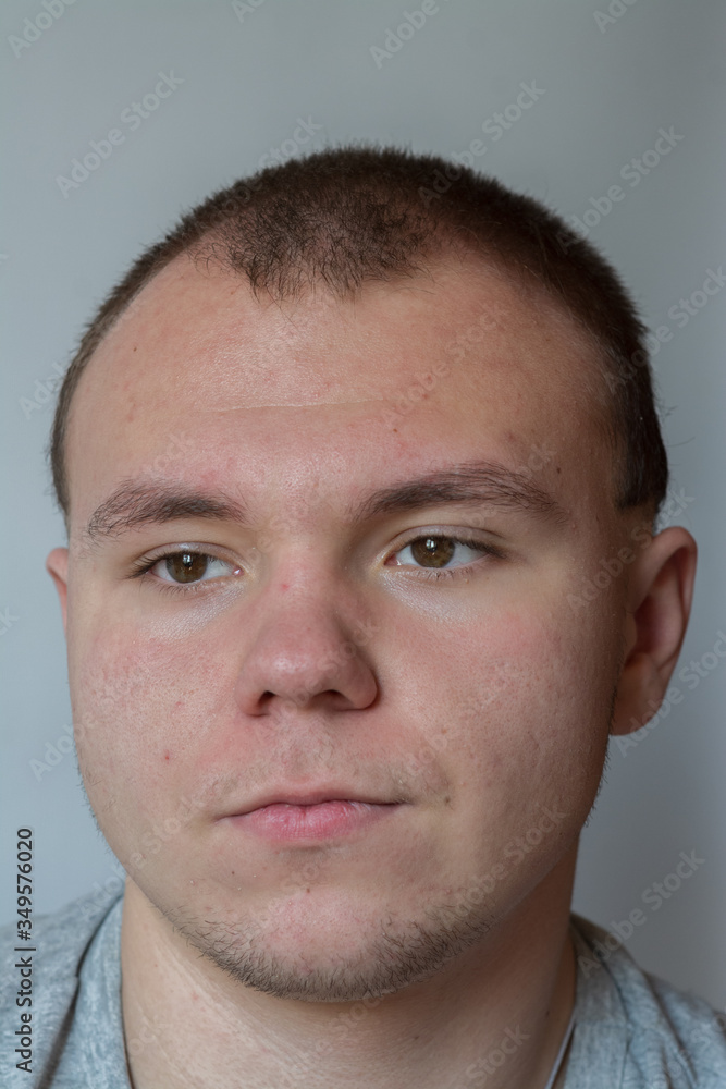 Emotions. The teenager expresses disbelief, doubt on his face. Emotions. The teenager expresses disbelief, doubt on his face.