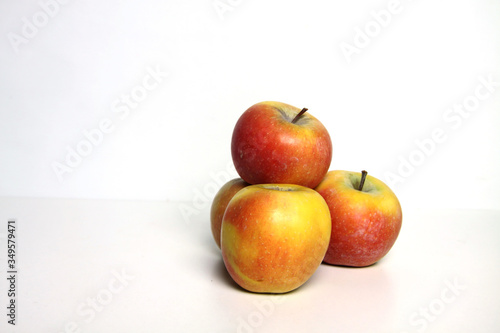 a pile of apples isolated on white background