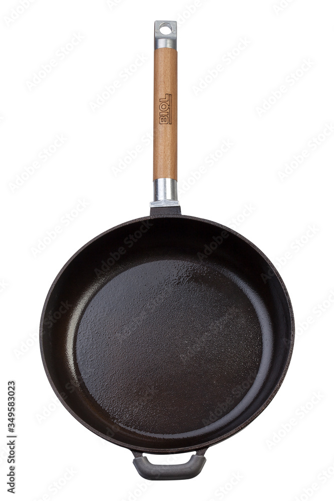 Cast iron pan isolated on white background with wooden handle
Cast iron pan isolated on white background with wooden handle