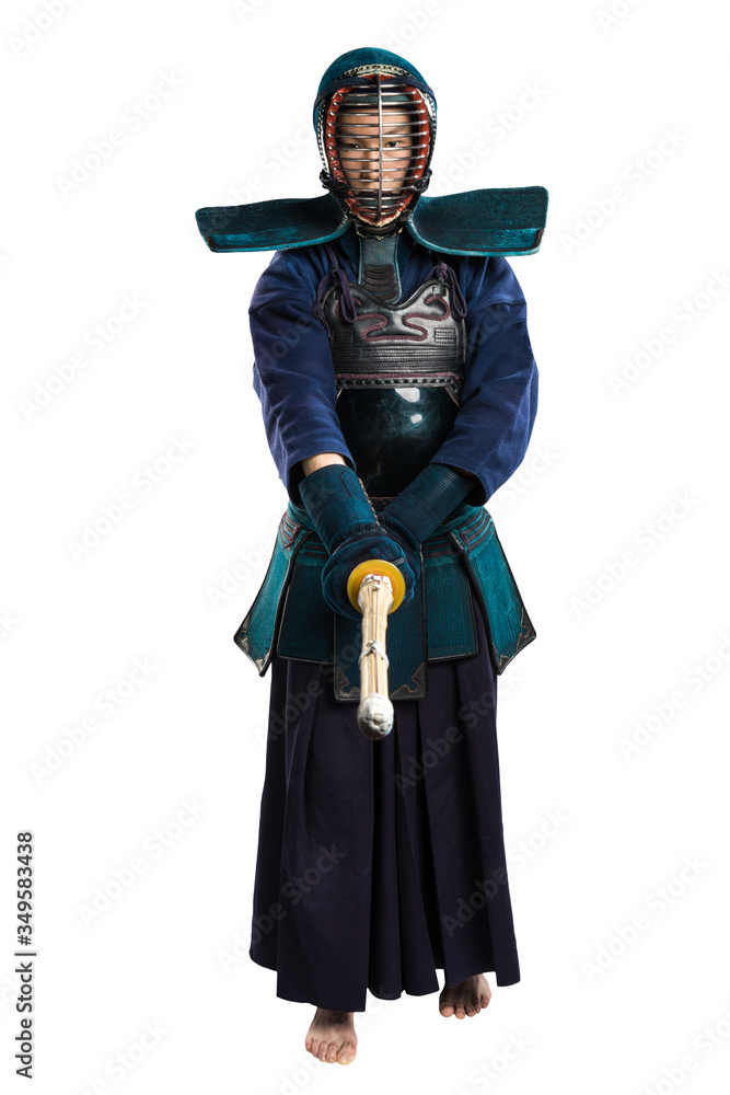 Obraz premium Portrait of man kendo fighter with shinai (bamboo sword). Shot in studio. Isolated with clipping path on white background