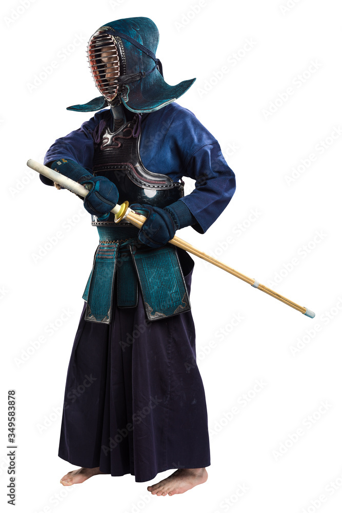 Portrait of man kendo fighter with shinai (bamboo sword). Shot in studio. Isolated with clipping path on white background Portrait of man kendo fighter with shinai (bamboo sword). Shot in studio. Isolated with clipping path on white background