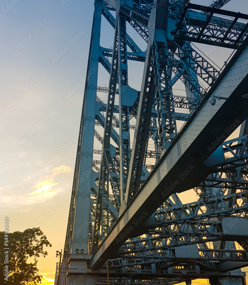 Fototapeta premium Structure of the famous Howrah Bridge in the evening in Kolkata, India