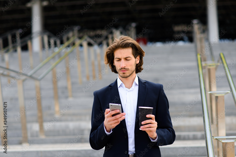 Portrait of an handsome businessman in the city. Portrait of an handsome businessman in the city.