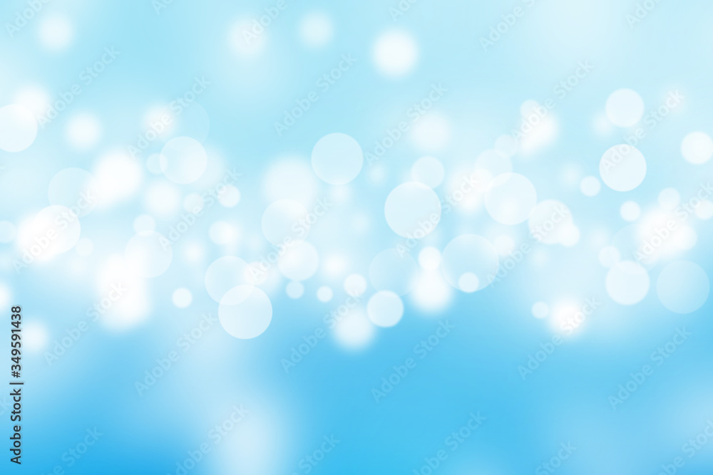 Abstract bright bokeh on blue sky blurred background.
