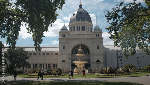 Royal Exhibition Building and the iconic water fountain and royal architect, with the view from Melbourne Museum, Melbourne, VIC, Australia photo