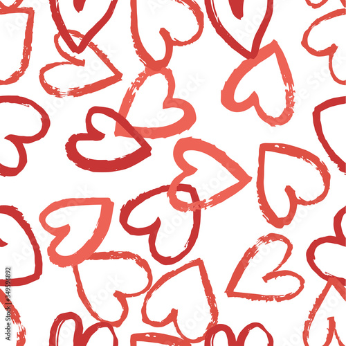 Seamless pattern with hearts in shades of red on white background. Vector design for textile, backgrounds, clothes, wrapping paper, web sites and wallpaper. Fashion illustration seamless pattern.