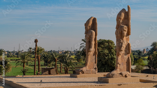 The two colossi of Amenhotep III at the northern gate of the temple of Amenhotep III. Luxor. Egypt.