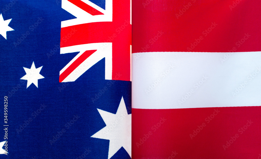fragments of the national flags of Australia and the Republic of Austria close up fragments of the national flags of Australia and the Republic of Austria close up