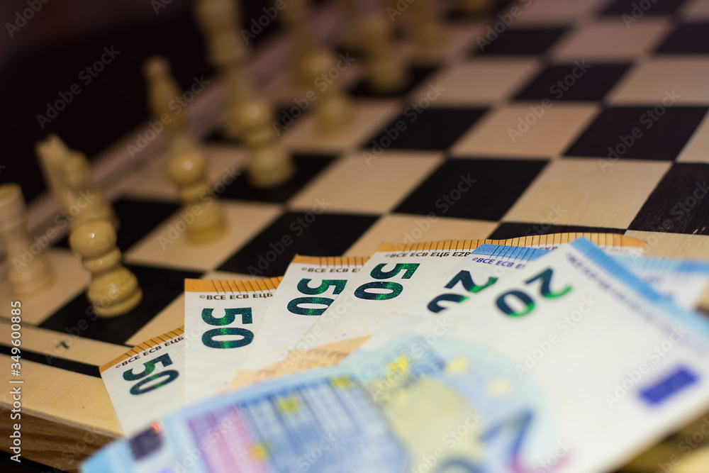 the chessboard ready to start the game and stake on one side. the chessboard ready to start the game and stake on one side.