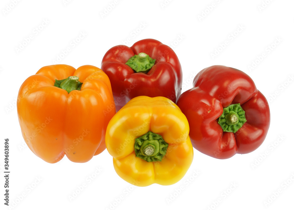 close up on fresh colorful peppers isolated on white background close up on fresh colorful peppers isolated on white background