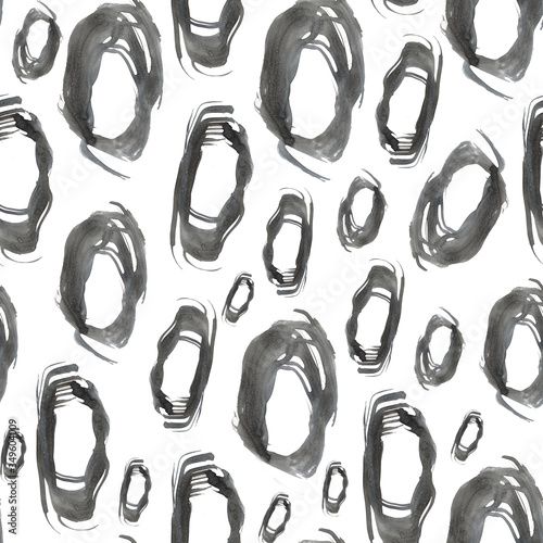 Seamless pattern with gray ovals. Hand-drawn ornament. Monochrome background. Abstract composition with watercolor painted circles.