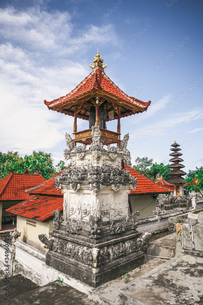 Buddhist temple on an island near a white beach with a broken rock Buddhist temple on an island near a white beach with a broken rock