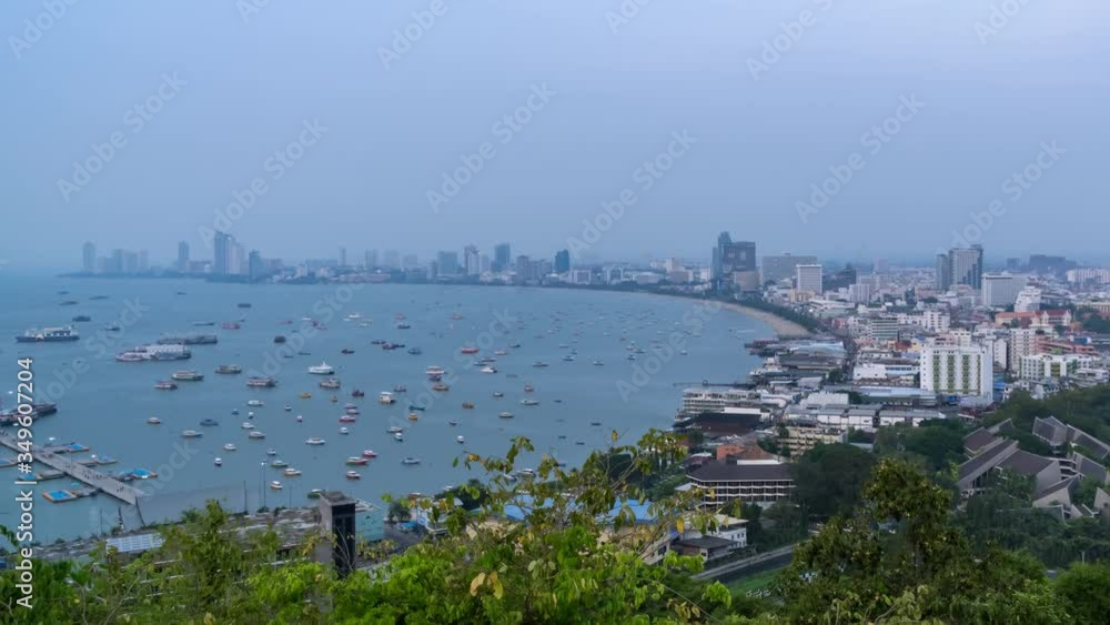 Pattaya bay and Bali Hai Pier, from Phra Tamnak Mountain viewpoint, day to night, Chonburi, Thailand; pan right - Time Lapse Pattaya bay and Bali Hai Pier, from Phra Tamnak Mountain viewpoint, day to night, Chonburi, Thailand; pan right - Time Lapse