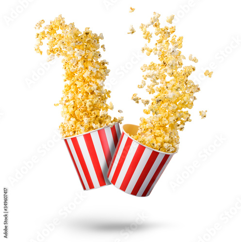 Set of flying popcorn from paper striped buckets isolated on white background