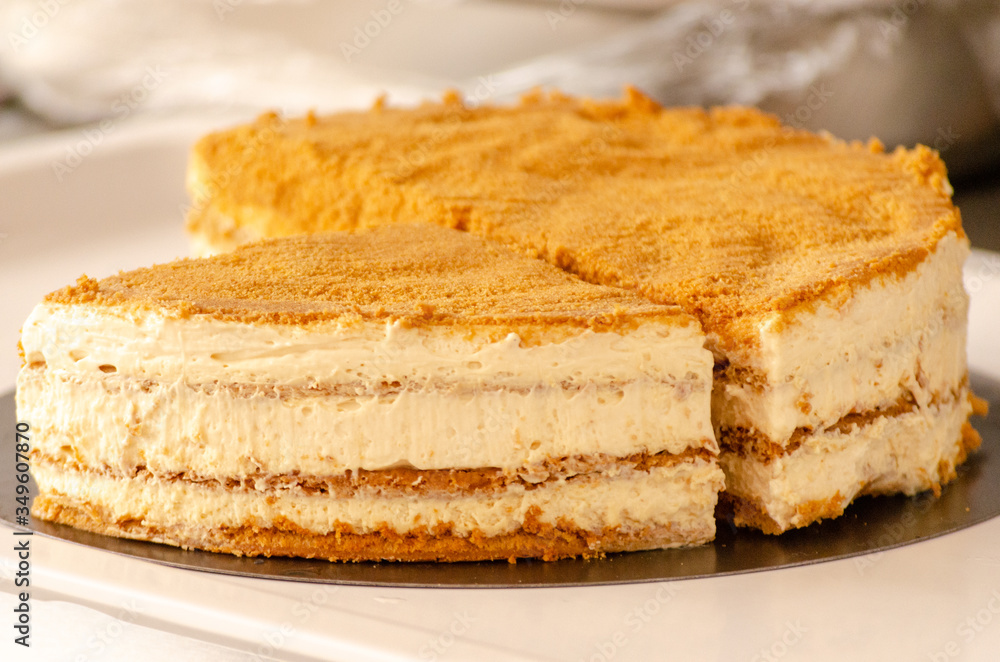 Cut French honey cake on table Cut French honey cake on table
