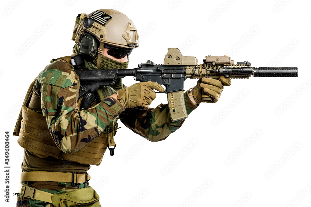 Fototapeta premium US marine corps soldier with rifle. Shot in studio. isolated with clipping on white background.