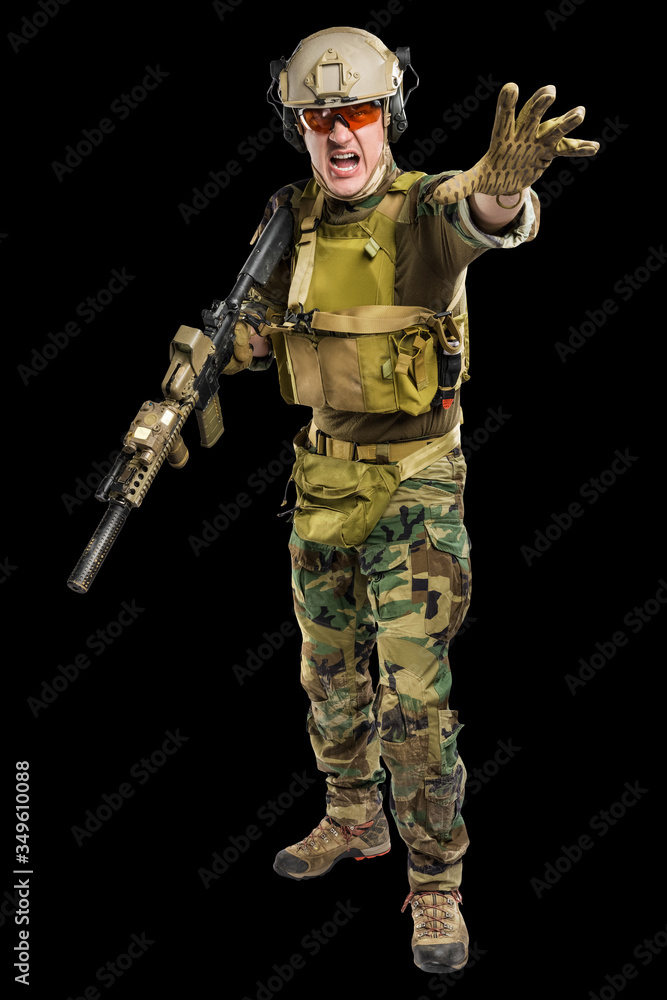 US marine corps soldier with rifle. Shot in studio. isolated with clipping on black background. US marine corps soldier with rifle. Shot in studio. isolated with clipping on black background.