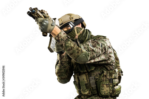 US marine corps soldier with weapon. Shot in studio. isolated with clipping on white background. 