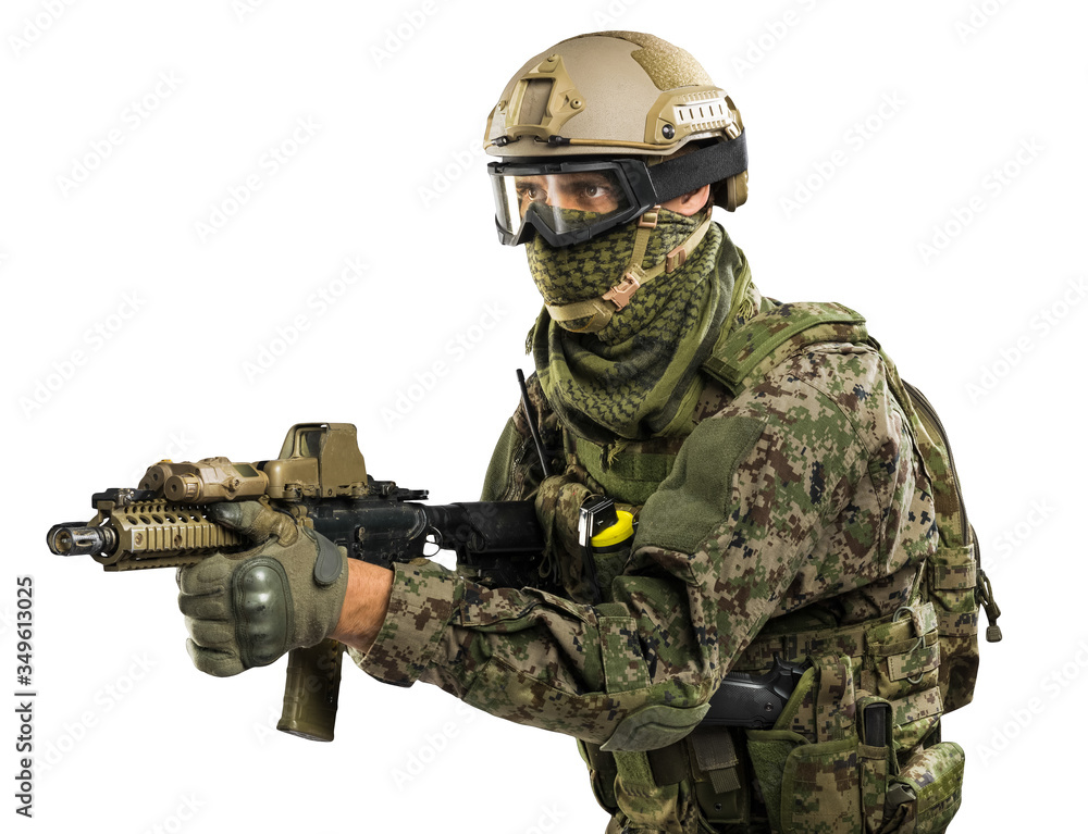 Fototapeta premium US marine corps soldier with weapon. Shot in studio. isolated with clipping on white background. 