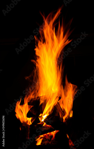 A lively camp fire against the black of the night. © Jurie
