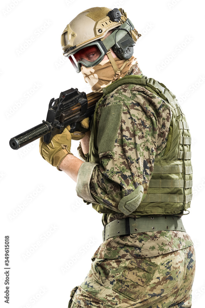 US marine corps soldier with weapon. Shot in studio. isolated with clipping on white background.
US marine corps soldier with weapon. Shot in studio. isolated with clipping on white background.