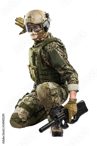 US marine corps soldier with weapon. Shot in studio. isolated with clipping on white background. 