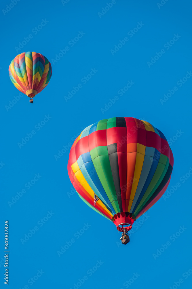 Colorful Hot Air Balloons In Flight At The Pahrump BalloonFest, Pahrump, Nevada, USA Colorful Hot Air Balloons In Flight At The Pahrump BalloonFest, Pahrump, Nevada, USA
