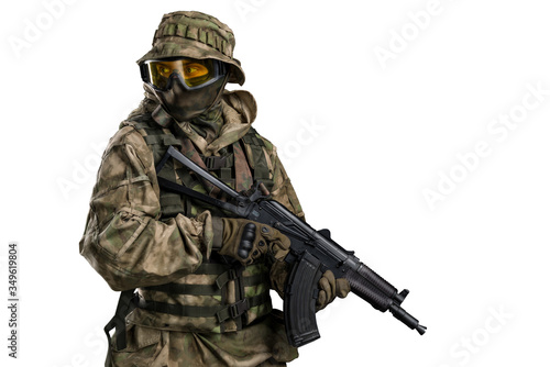 Special forces soldier with rifle. Shot in studio. Isolated with clipping path on white background. 
