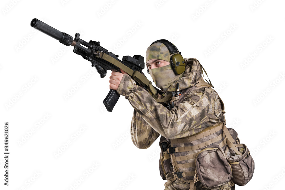 Special forces soldier with rifle. Shot in studio. Isolated with clipping path on white background.
