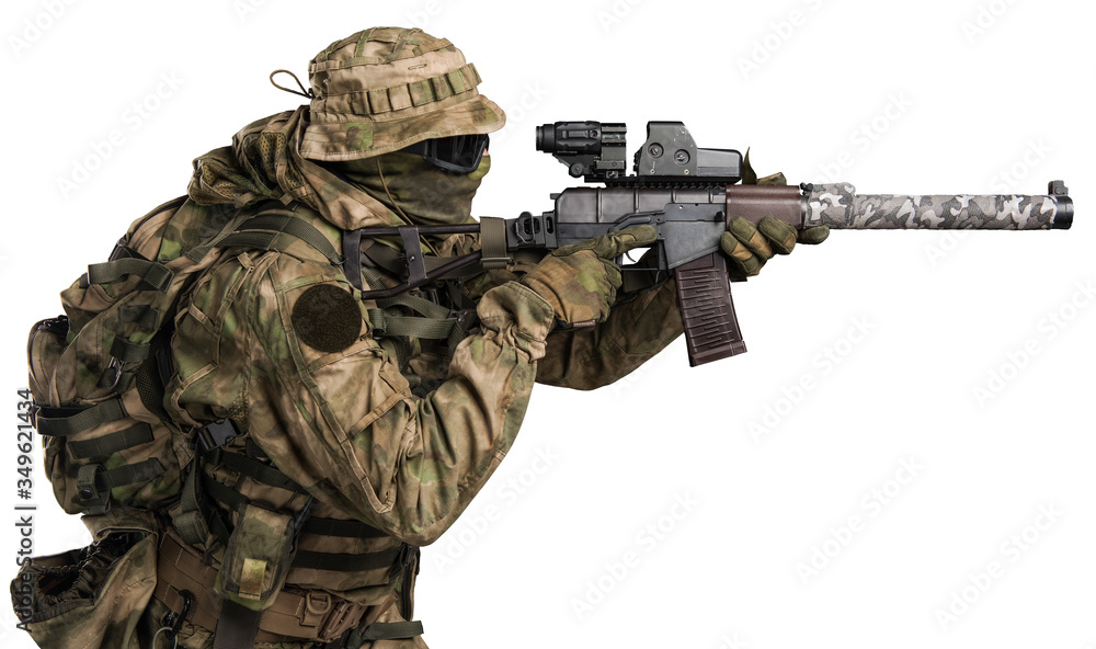 Fototapeta premium Special forces soldier with rifle. Shot in studio. Isolated with clipping path on white background.