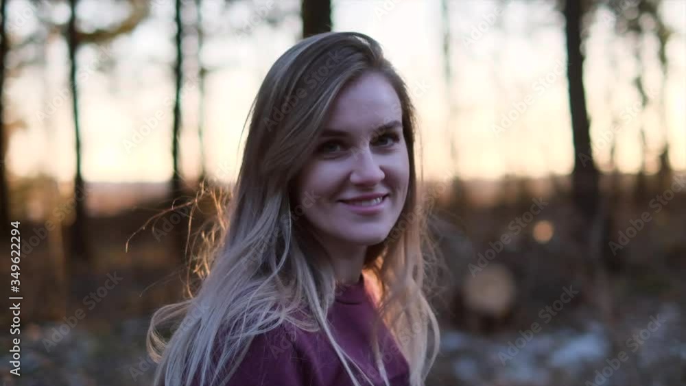 Beauty Girl with Healthy Long Hair Outdoors. Young Woman having Fun at sunset Beauty Girl with Healthy Long Hair Outdoors. Young Woman having Fun at sunset