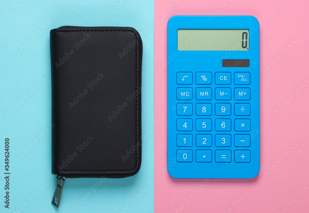 Wallet with calculator on a blue-pink pastel background. Top view Wallet with calculator on a blue-pink pastel background. Top view