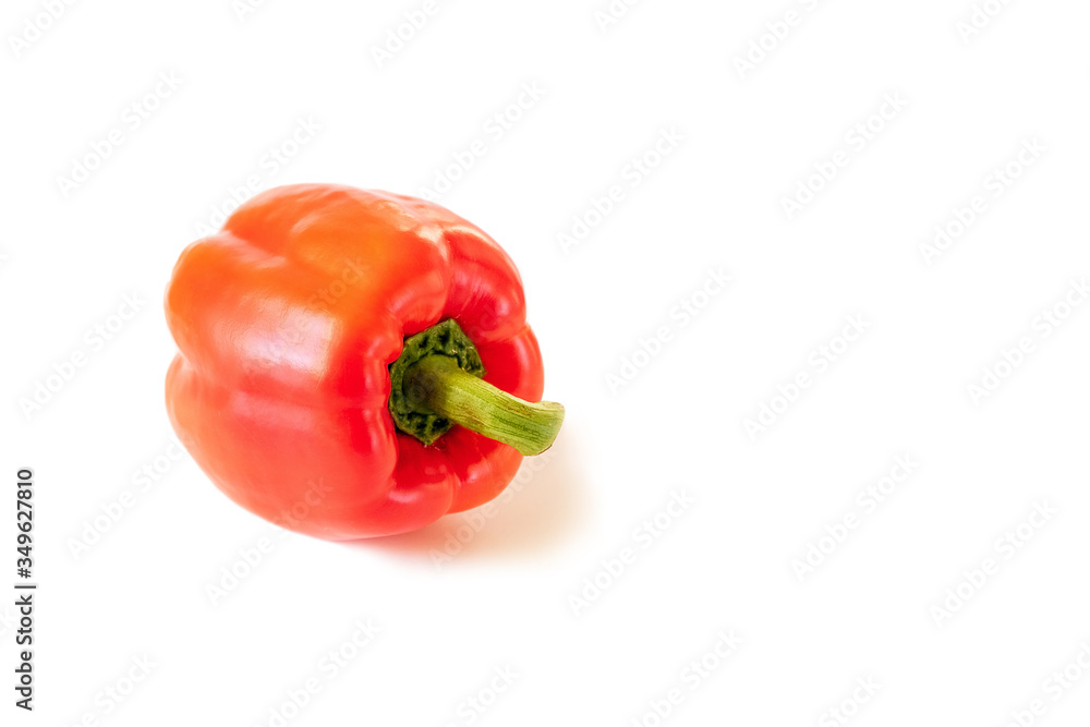 Red bell pepper highlighted on a white background, side view