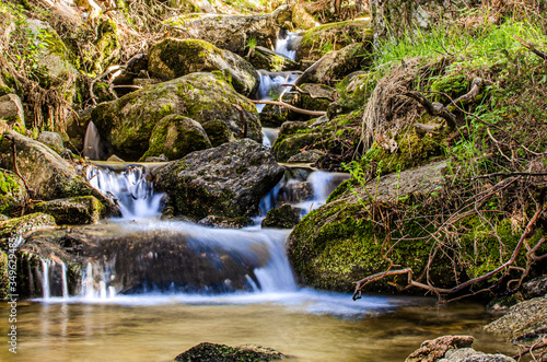 stream with waterfalls in Guadarrama sierra. madrid Spain