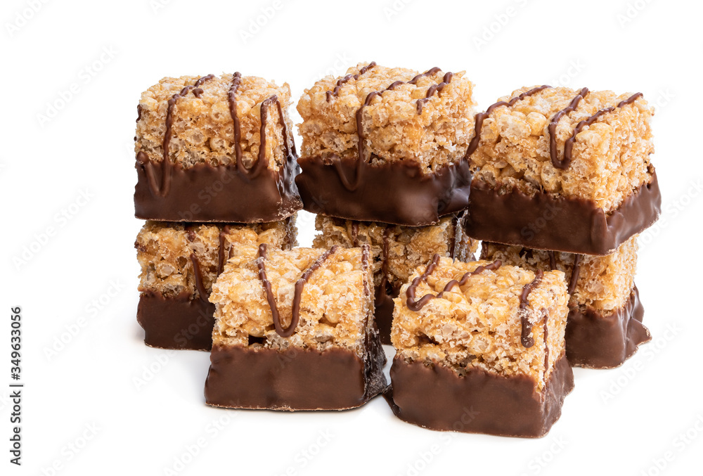Mini rice and syrup flapjack slices isolated on white Mini rice and syrup flapjack slices isolated on white