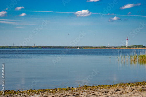 Bay shore against the blue sky