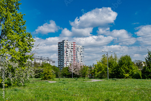high-rise crane on the background of built houses